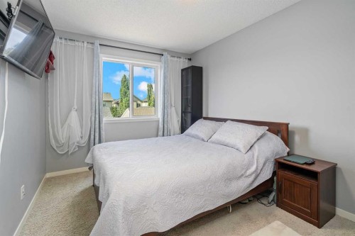 191 Cranford Crescent Se, Calgary, AB - Indoor Photo Showing Bedroom