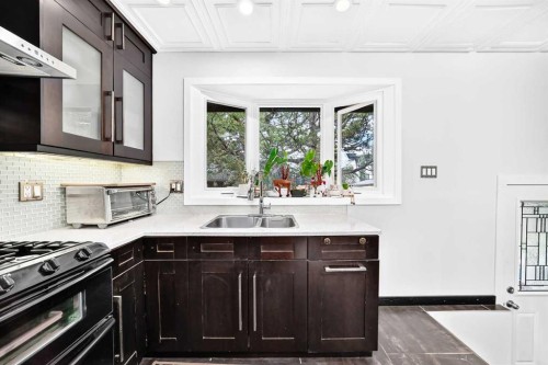 4832 Worcester Drive Sw, Calgary, AB - Indoor Photo Showing Kitchen With Double Sink