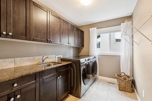 9062 14 Avenue Sw, Calgary, AB - Indoor Photo Showing Laundry Room