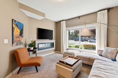 9062 14 Avenue Sw, Calgary, AB - Indoor Photo Showing Living Room With Fireplace