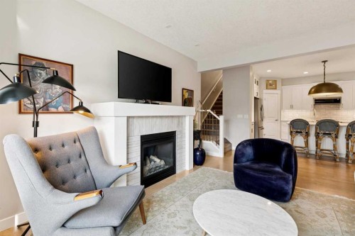 9062 14 Avenue Sw, Calgary, AB - Indoor Photo Showing Living Room With Fireplace
