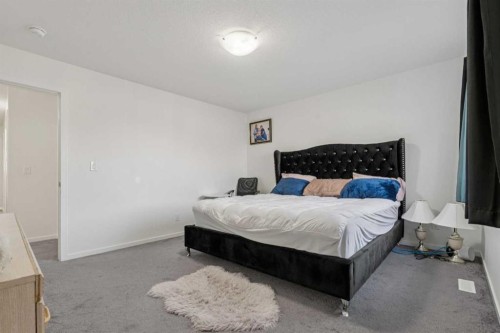 223 Carrington Circle, Calgary, AB - Indoor Photo Showing Bedroom