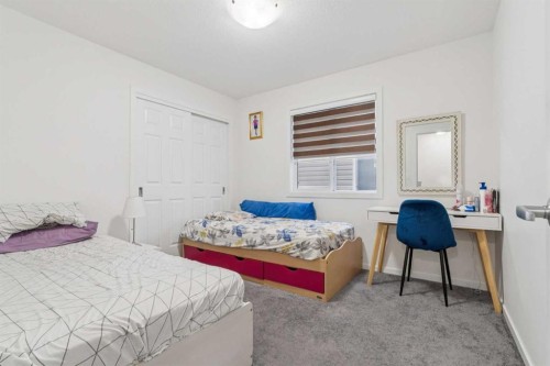 223 Carrington Circle, Calgary, AB - Indoor Photo Showing Bedroom
