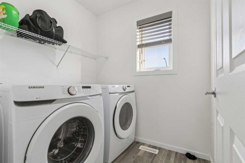 223 Carrington Circle, Calgary, AB - Indoor Photo Showing Laundry Room