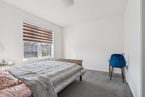 223 Carrington Circle, Calgary, AB - Indoor Photo Showing Bedroom