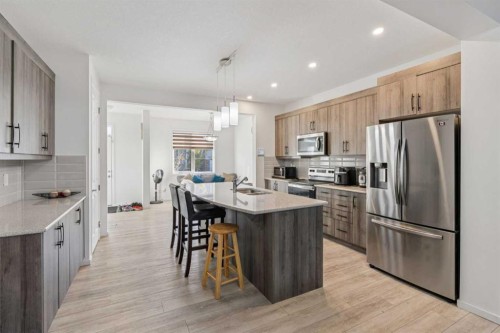 223 Carrington Circle, Calgary, AB - Indoor Photo Showing Kitchen With Upgraded Kitchen