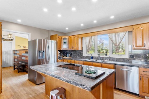 31170 Range Road 42 Range, Rural Mountain View County, AB - Indoor Photo Showing Kitchen With Double Sink