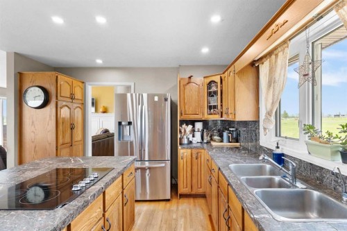 31170 Range Road 42 Range, Rural Mountain View County, AB - Indoor Photo Showing Kitchen With Double Sink With Upgraded Kitchen