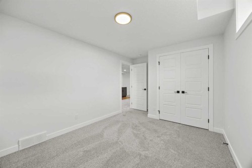 37 Sora Gardens Se, Calgary, AB - Indoor Photo Showing Other Room