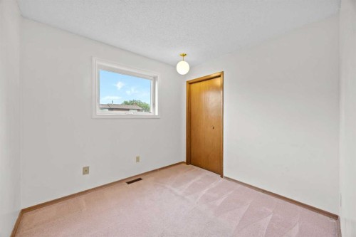 147 Whitlock Close Ne, Calgary, AB - Indoor Photo Showing Other Room