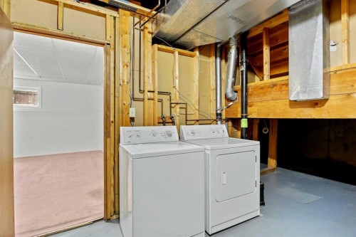 147 Whitlock Close Ne, Calgary, AB - Indoor Photo Showing Laundry Room