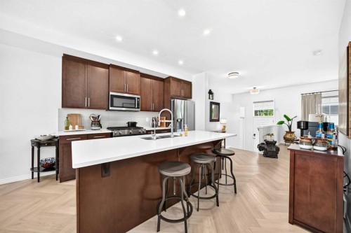 56 Cranarch Road Se, Calgary, AB - Indoor Photo Showing Kitchen With Upgraded Kitchen