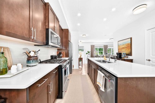 56 Cranarch Road Se, Calgary, AB - Indoor Photo Showing Kitchen With Double Sink With Upgraded Kitchen