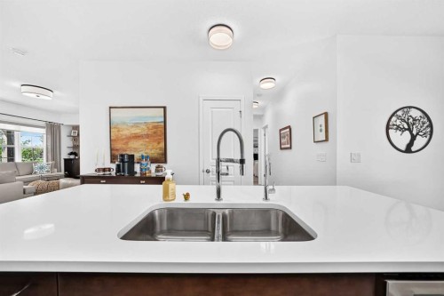 56 Cranarch Road Se, Calgary, AB - Indoor Photo Showing Kitchen With Double Sink