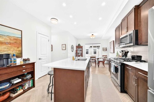 56 Cranarch Road Se, Calgary, AB - Indoor Photo Showing Kitchen With Double Sink With Upgraded Kitchen