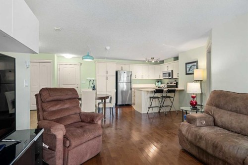 208-304 Cranberry Park Se, Calgary, AB - Indoor Photo Showing Living Room