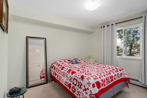 208-304 Cranberry Park Se, Calgary, AB - Indoor Photo Showing Bedroom