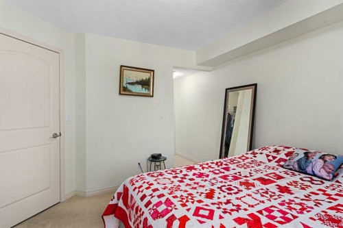 208-304 Cranberry Park Se, Calgary, AB - Indoor Photo Showing Bedroom