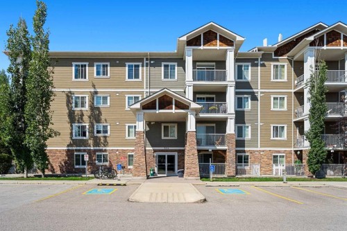 208-304 Cranberry Park Se, Calgary, AB - Outdoor With Balcony With Facade