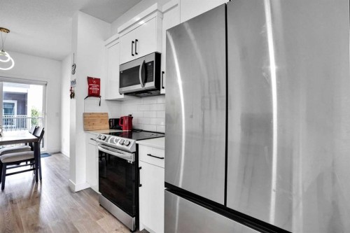 241 Saddlepeace Crescent Ne, Calgary, AB - Indoor Photo Showing Kitchen