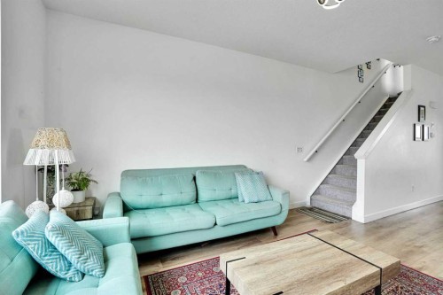 241 Saddlepeace Crescent Ne, Calgary, AB - Indoor Photo Showing Living Room