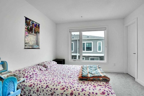 241 Saddlepeace Crescent Ne, Calgary, AB - Indoor Photo Showing Bedroom