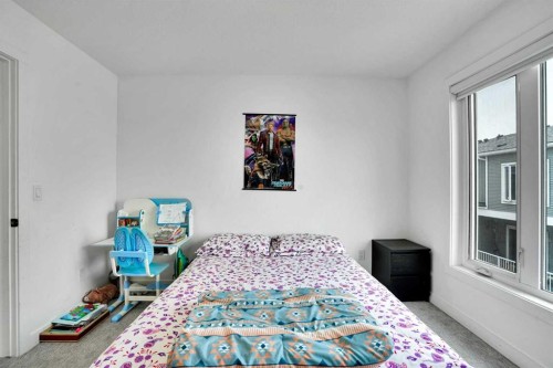241 Saddlepeace Crescent Ne, Calgary, AB - Indoor Photo Showing Bedroom