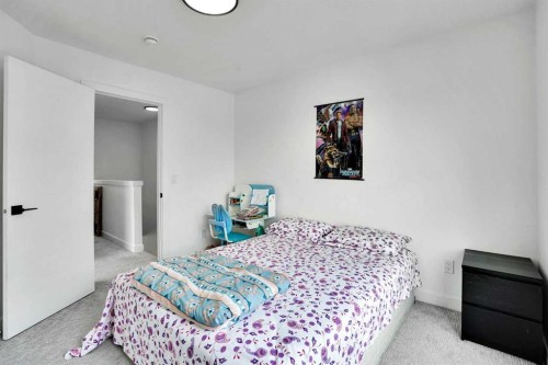 241 Saddlepeace Crescent Ne, Calgary, AB - Indoor Photo Showing Bedroom
