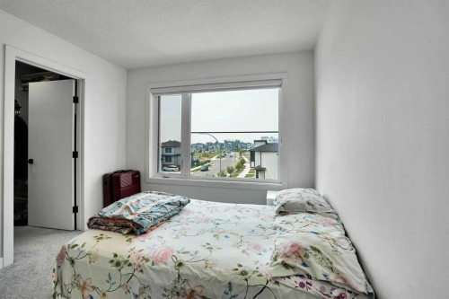 241 Saddlepeace Crescent Ne, Calgary, AB - Indoor Photo Showing Bedroom