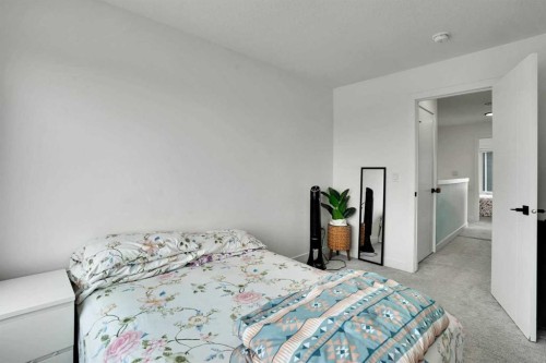241 Saddlepeace Crescent Ne, Calgary, AB - Indoor Photo Showing Bedroom