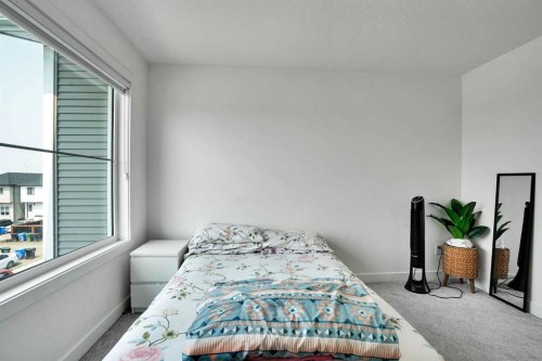 241 Saddlepeace Crescent Ne, Calgary, AB - Indoor Photo Showing Bedroom