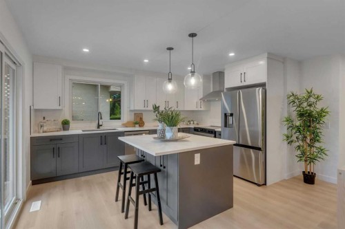 104 Oakmoor Place Sw, Calgary, AB - Indoor Photo Showing Kitchen With Stainless Steel Kitchen With Upgraded Kitchen