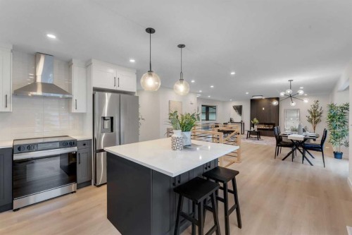 104 Oakmoor Place Sw, Calgary, AB - Indoor Photo Showing Kitchen With Stainless Steel Kitchen With Upgraded Kitchen