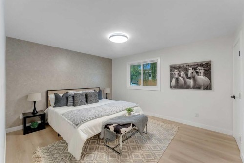 104 Oakmoor Place Sw, Calgary, AB - Indoor Photo Showing Bedroom