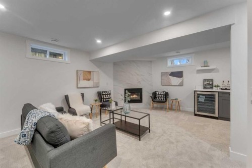 104 Oakmoor Place Sw, Calgary, AB - Indoor Photo Showing Other Room With Fireplace