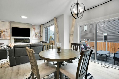 159 Hotchkiss Manor Se, Calgary, AB - Indoor Photo Showing Dining Room