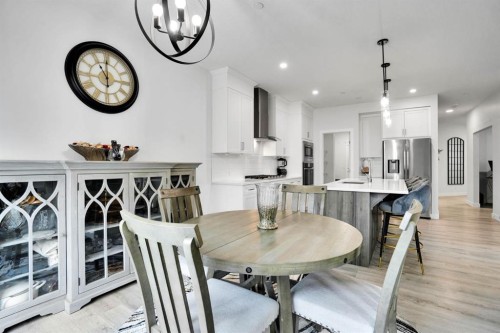 159 Hotchkiss Manor Se, Calgary, AB - Indoor Photo Showing Dining Room