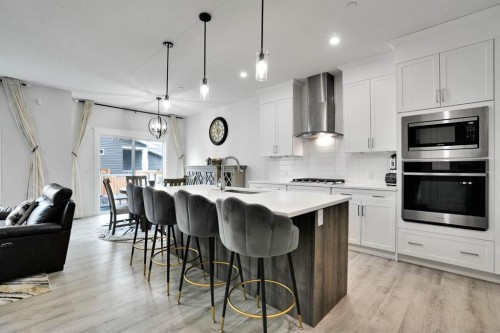 159 Hotchkiss Manor Se, Calgary, AB - Indoor Photo Showing Kitchen With Upgraded Kitchen