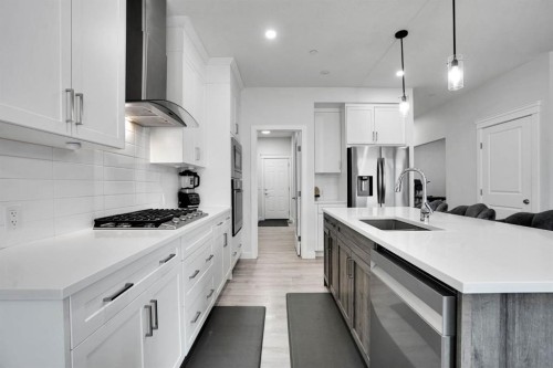 159 Hotchkiss Manor Se, Calgary, AB - Indoor Photo Showing Kitchen With Upgraded Kitchen