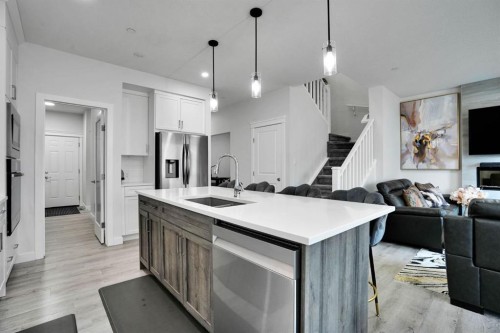 159 Hotchkiss Manor Se, Calgary, AB - Indoor Photo Showing Kitchen With Upgraded Kitchen