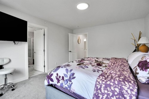 159 Hotchkiss Manor Se, Calgary, AB - Indoor Photo Showing Bedroom