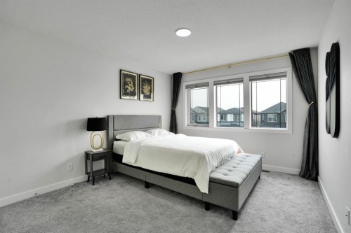 159 Hotchkiss Manor Se, Calgary, AB - Indoor Photo Showing Bedroom