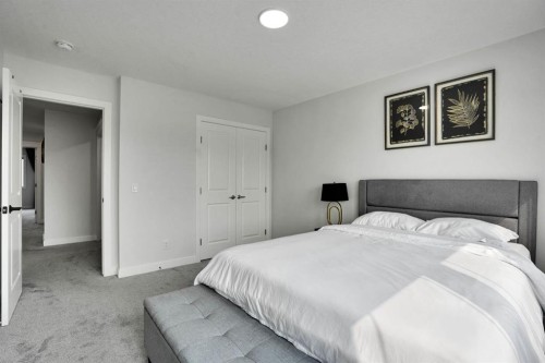 159 Hotchkiss Manor Se, Calgary, AB - Indoor Photo Showing Bedroom