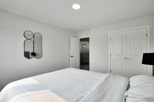 159 Hotchkiss Manor Se, Calgary, AB - Indoor Photo Showing Bedroom