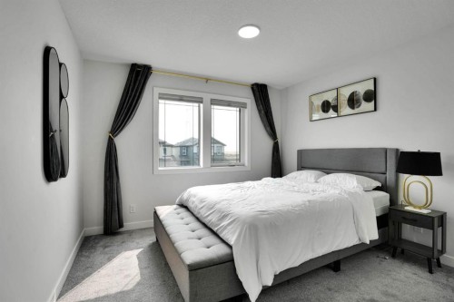 159 Hotchkiss Manor Se, Calgary, AB - Indoor Photo Showing Bedroom