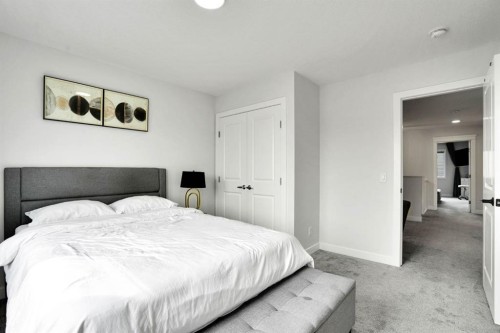 159 Hotchkiss Manor Se, Calgary, AB - Indoor Photo Showing Bedroom