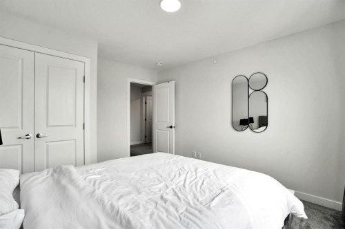 159 Hotchkiss Manor Se, Calgary, AB - Indoor Photo Showing Bedroom