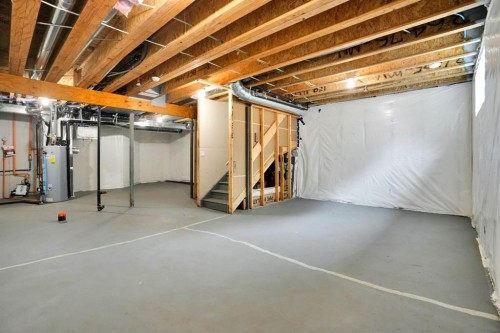 159 Hotchkiss Manor Se, Calgary, AB - Indoor Photo Showing Basement