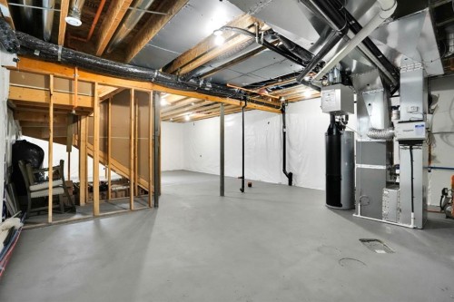 159 Hotchkiss Manor Se, Calgary, AB - Indoor Photo Showing Basement