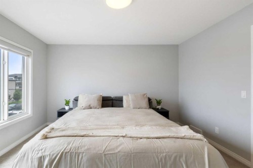 28 Seton Terrace Se, Calgary, AB - Indoor Photo Showing Bedroom